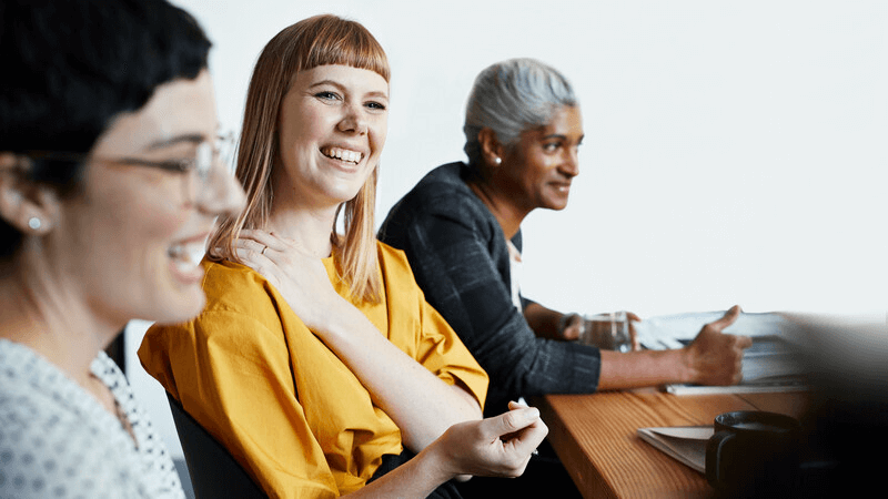 Three Colleagues Smiling